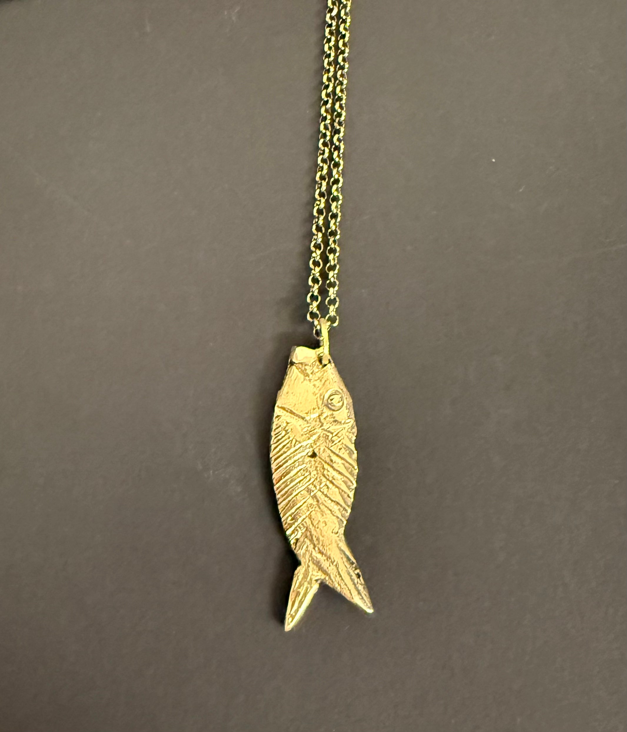 Fusione brass fish pendant