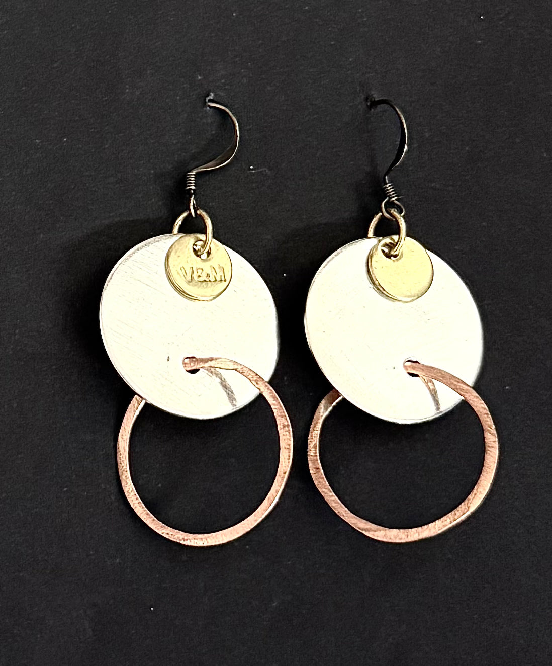 Disc and hoop mixed metal earrings