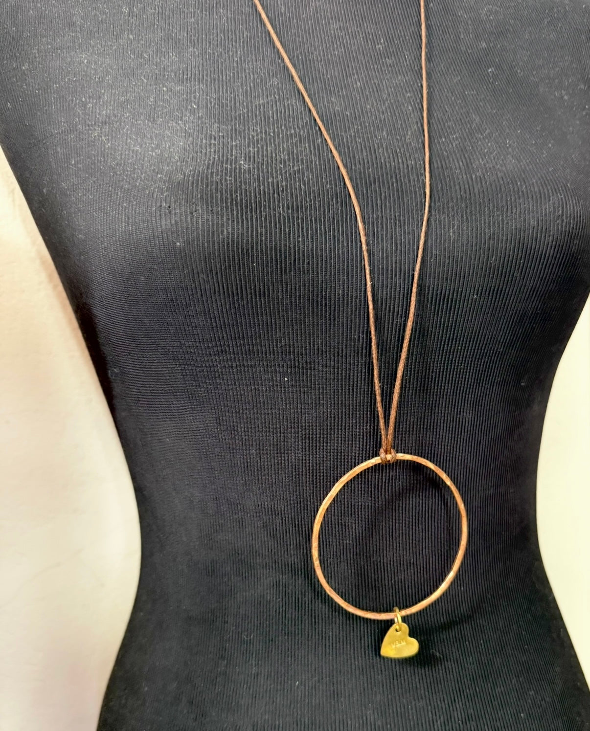 Thin copper bangle with round brass bead