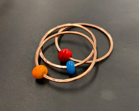 Thin copper bangle with Murano glass bead