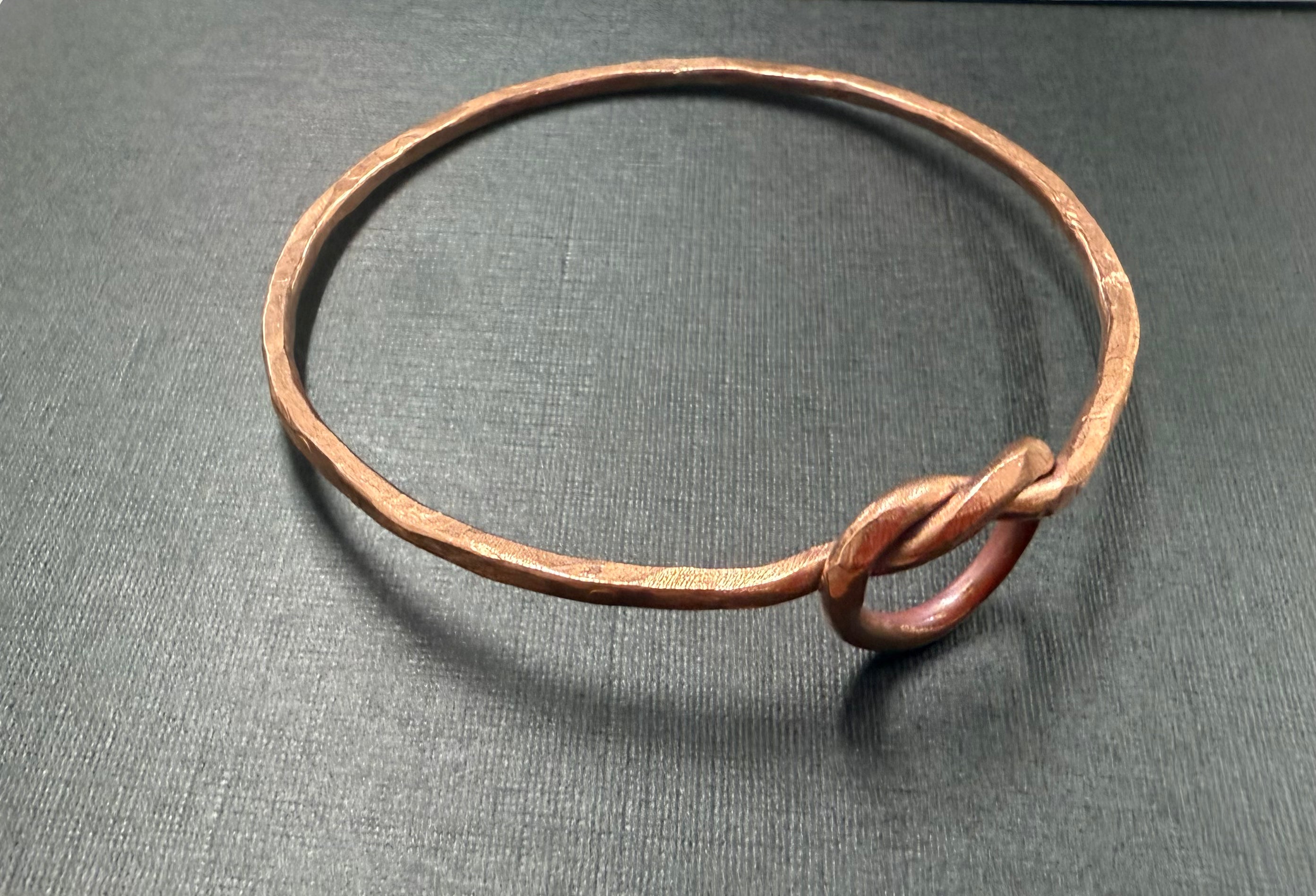 Thin copper knot bangle