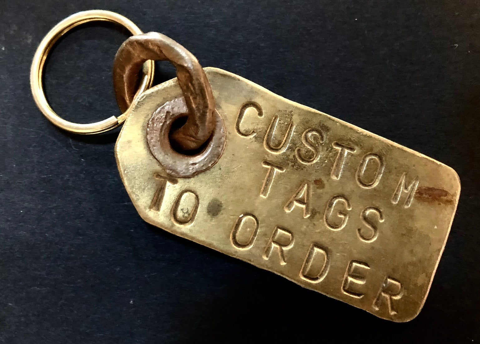 Custom stamped luggage tag