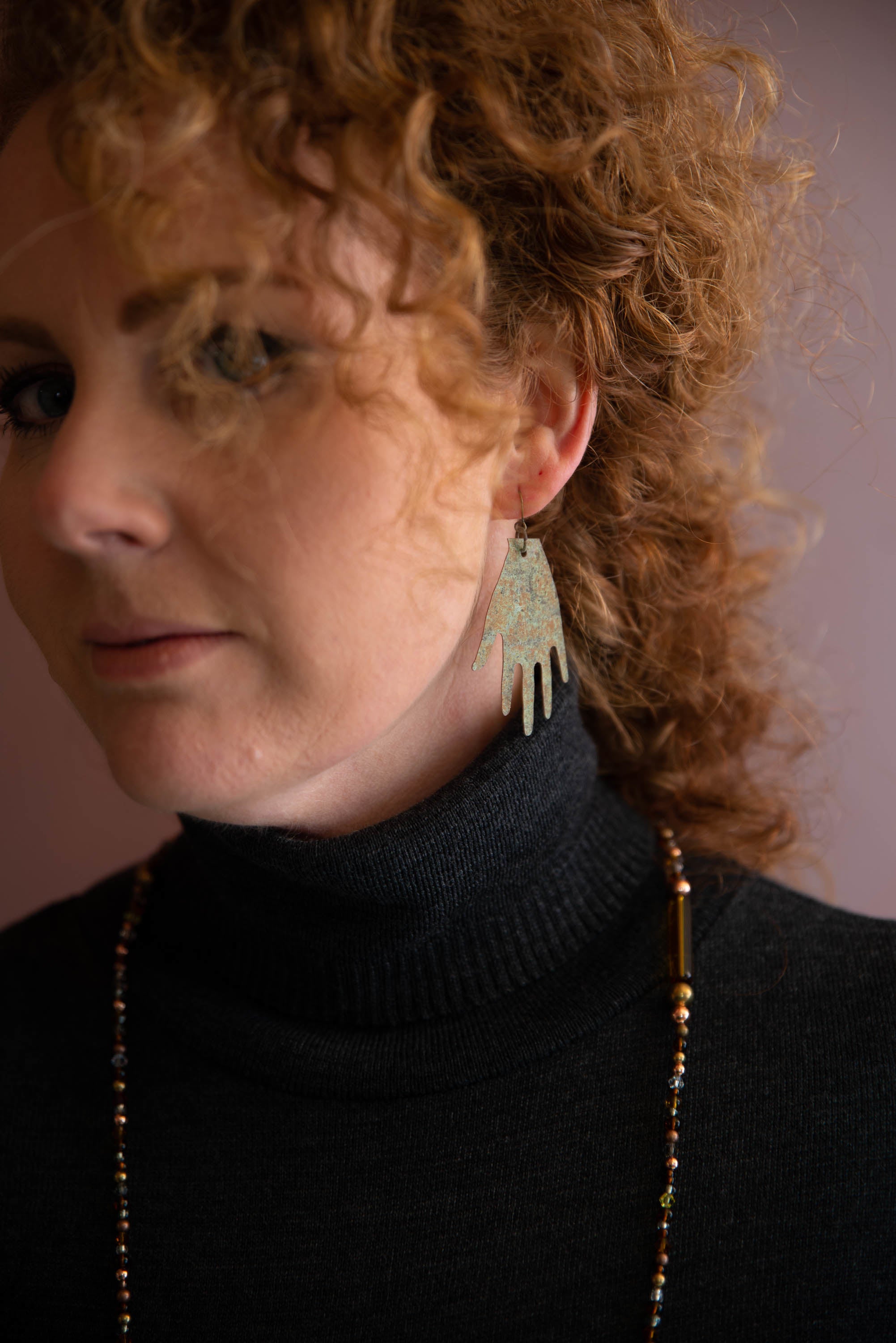 Church roof hands big earrings