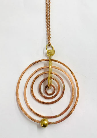 Concentric circles copper pendant