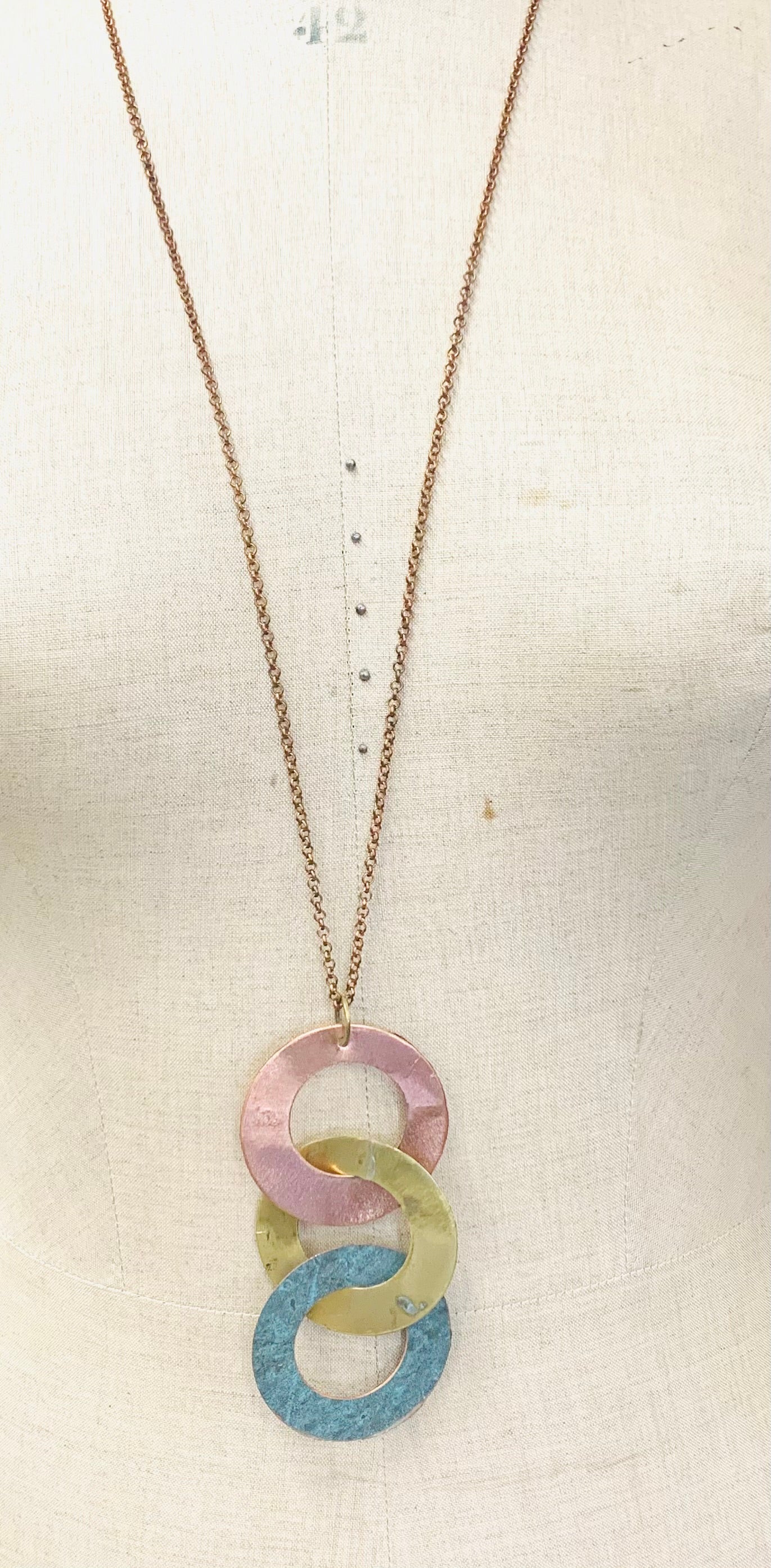 Interlinking large disc mixed metal pendant