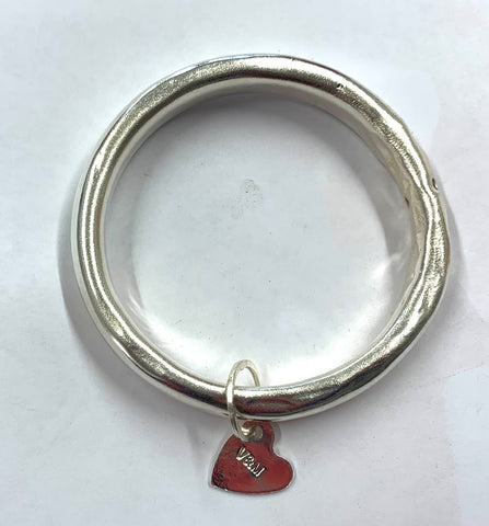 Silver anvil bangle with heart