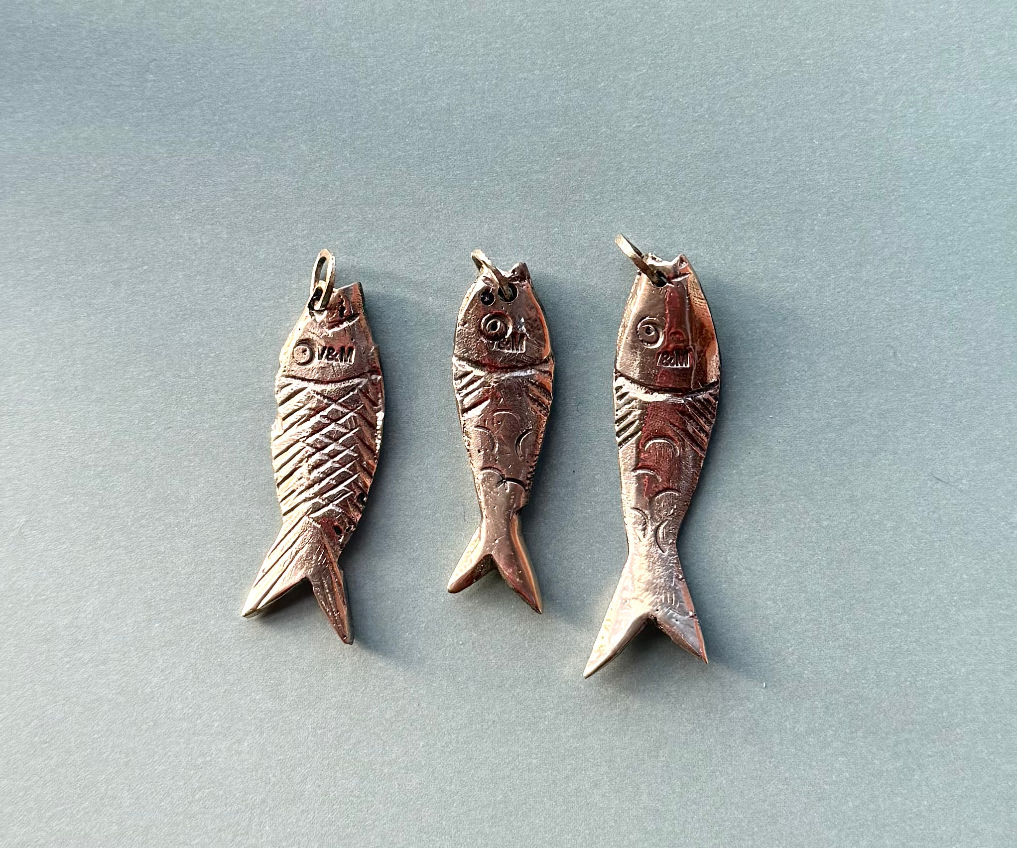 Fusione brass fish pendant