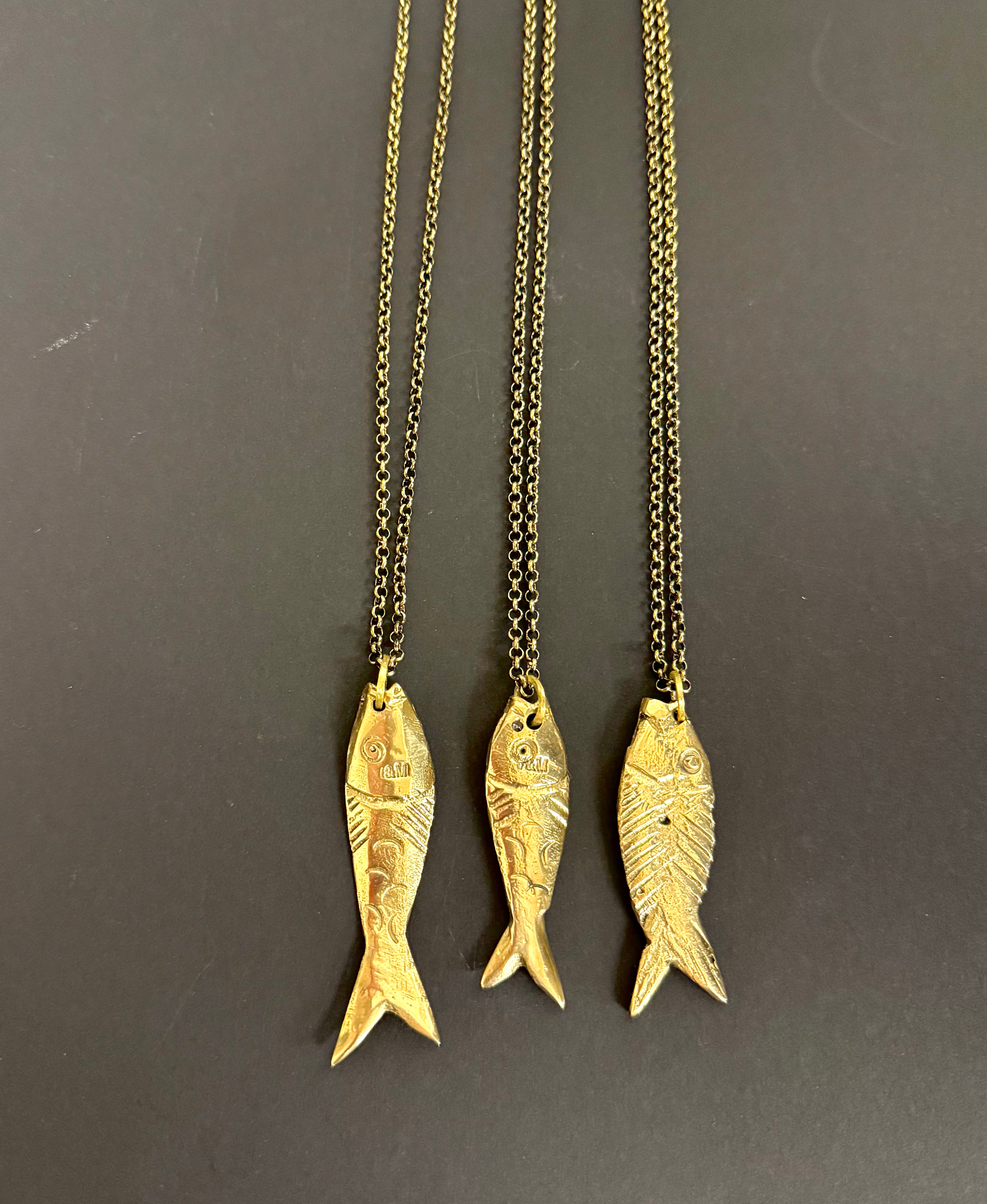 Fusione brass fish pendant