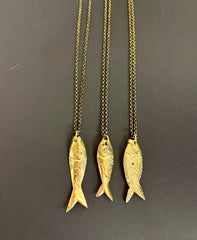 Fusione brass fish pendant