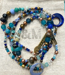 Long glass and metal beads
