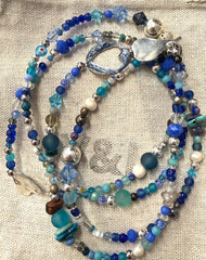 Long glass and metal beads