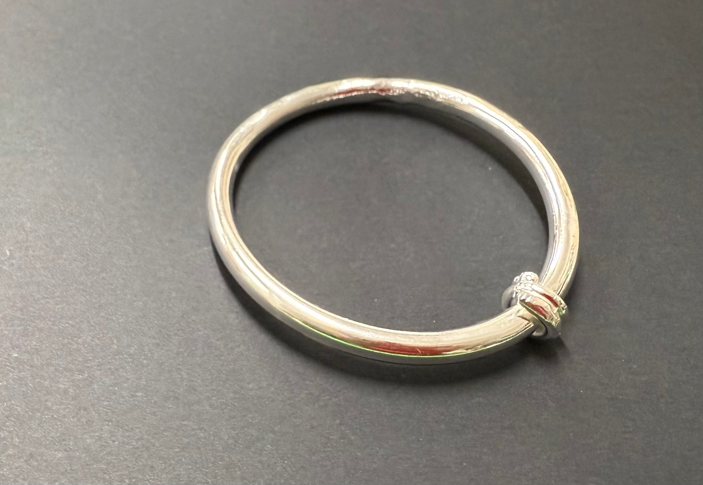 Classic silver bangle with wrapping