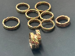 Plaited copper and brass ring
