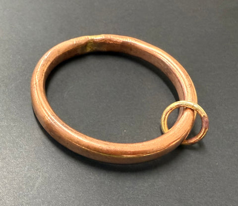 Copper anvil bangle with brass loop