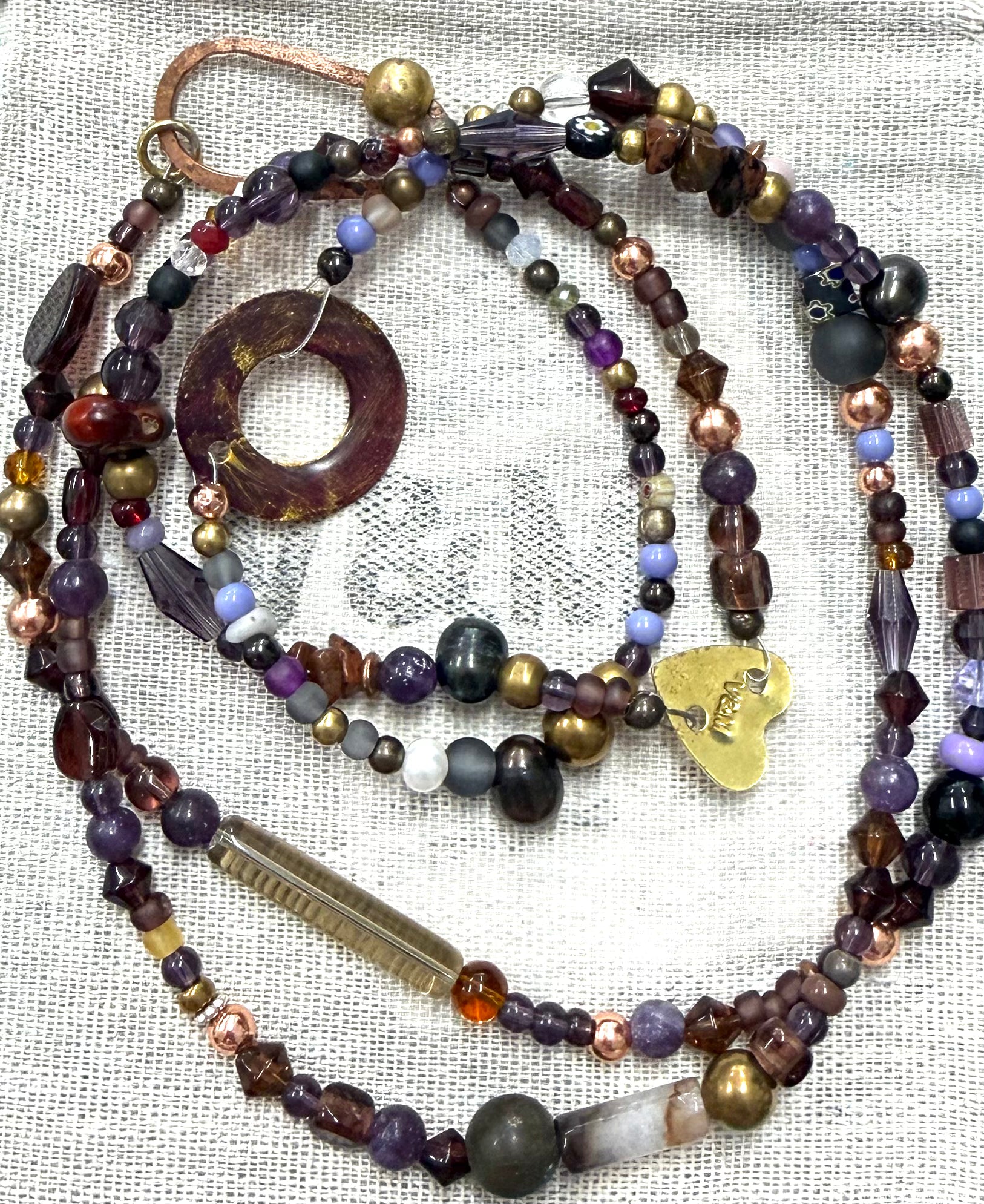 Long glass and metal beads