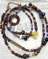 Long glass and metal beads