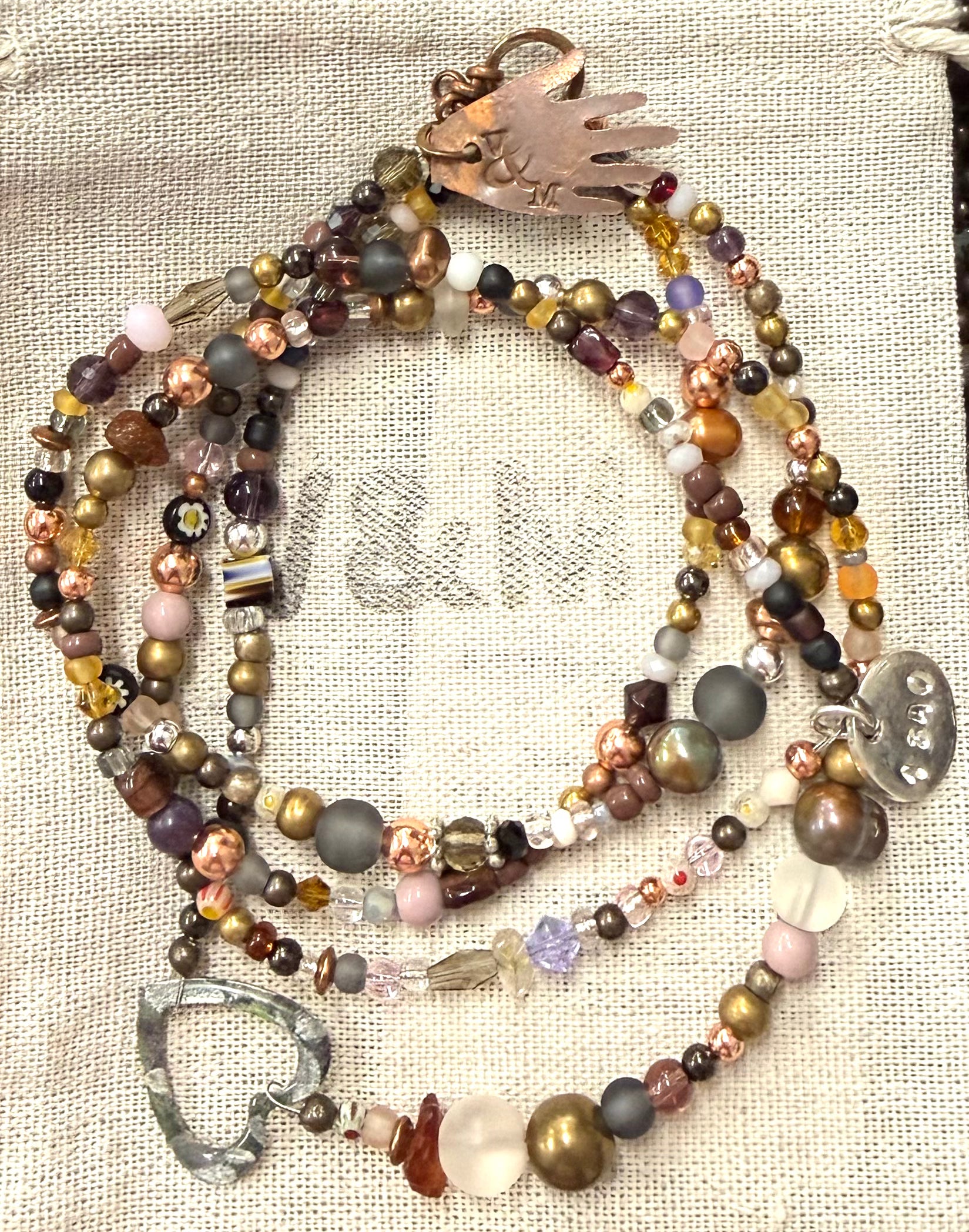 Long glass and metal beads