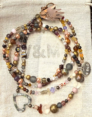 Long glass and metal beads