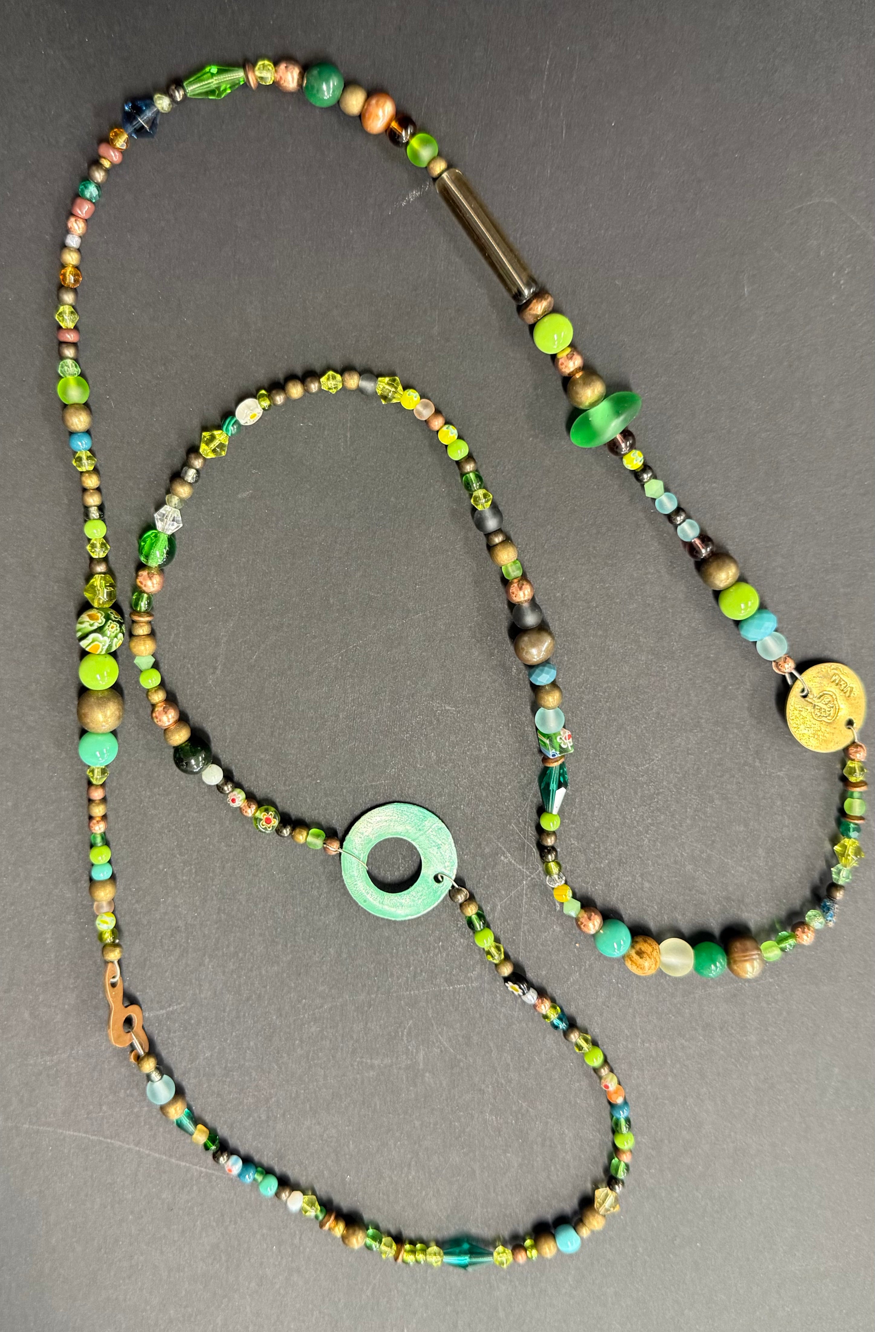Long glass and metal beads