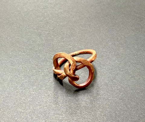 Intricate copper knot ring