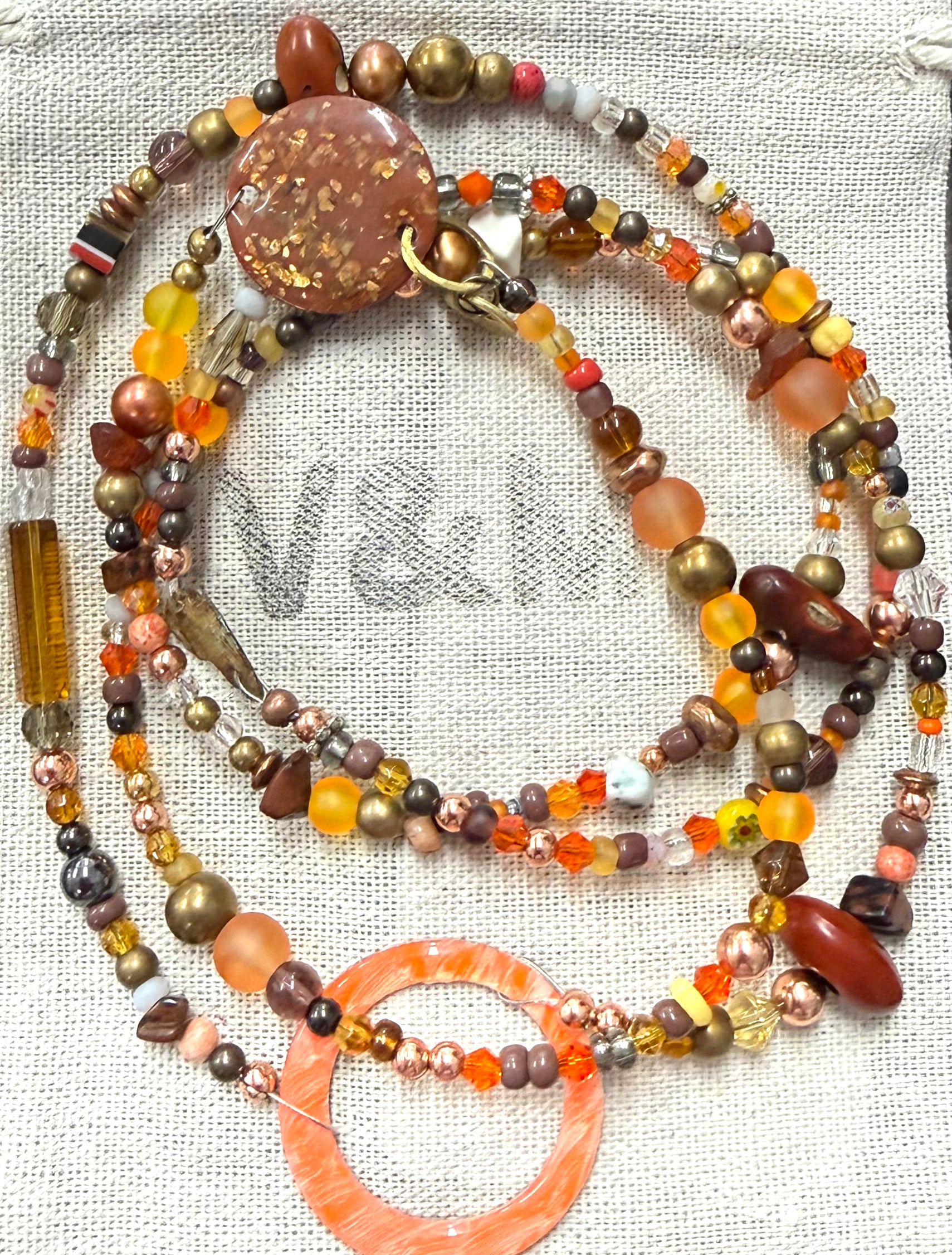 Long glass and metal beads