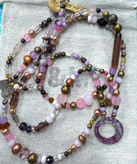 Long glass and metal beads