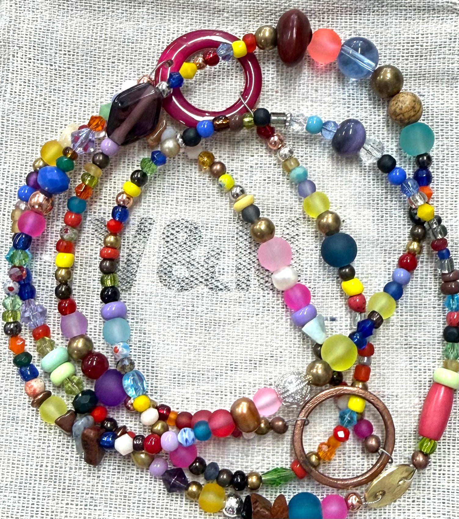 Long glass and metal beads