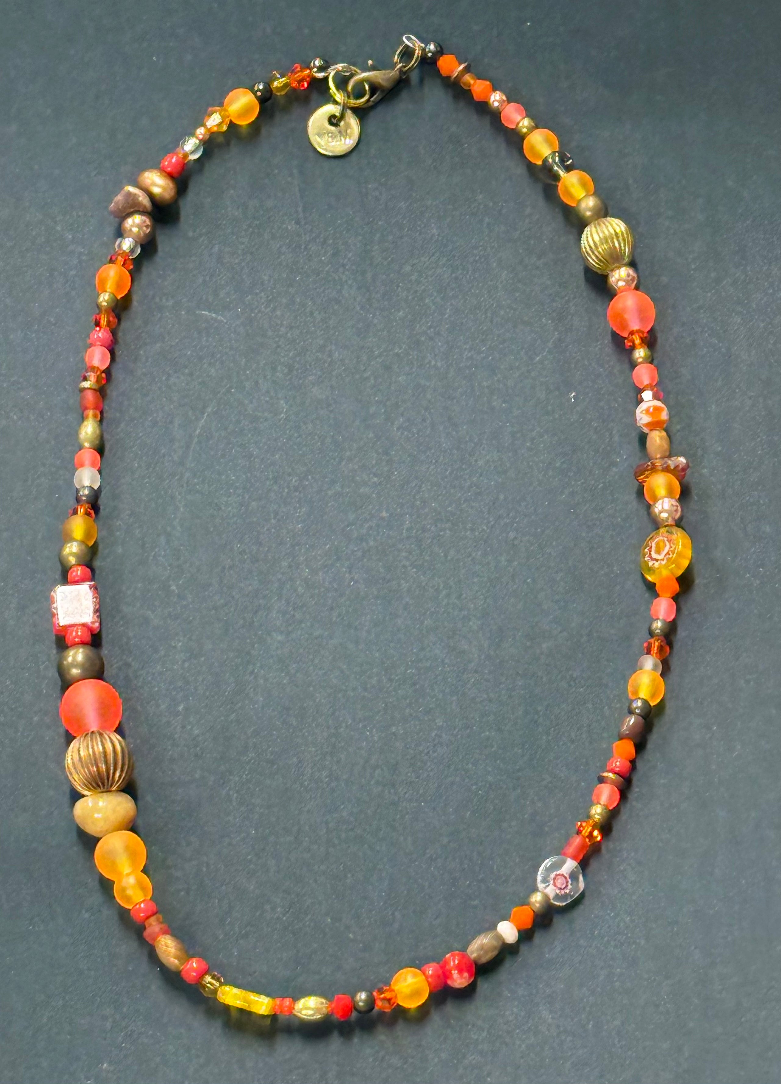 Short glass and metal beads