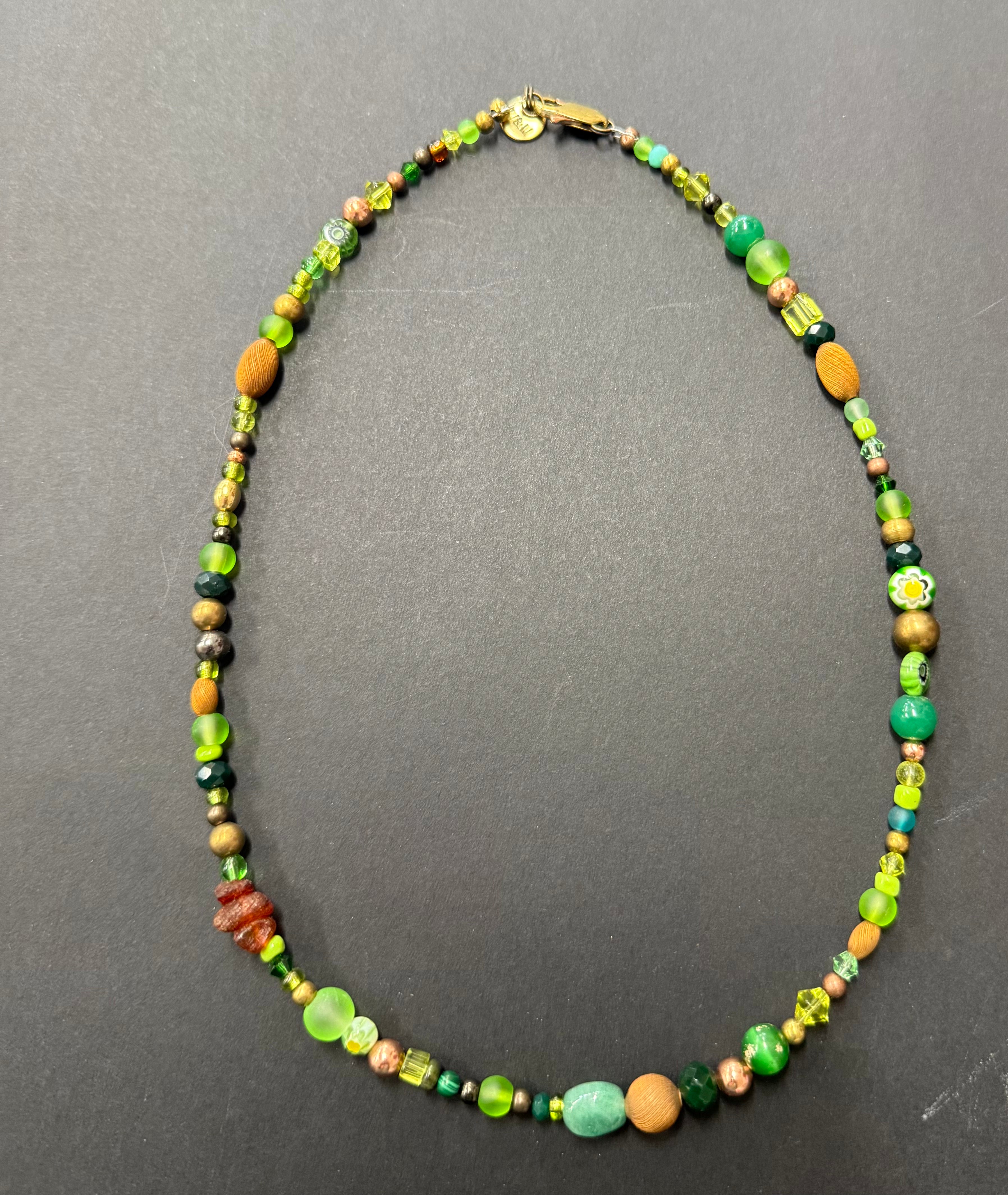 Short glass and metal beads