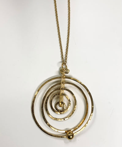 Concentric circles brass pendant