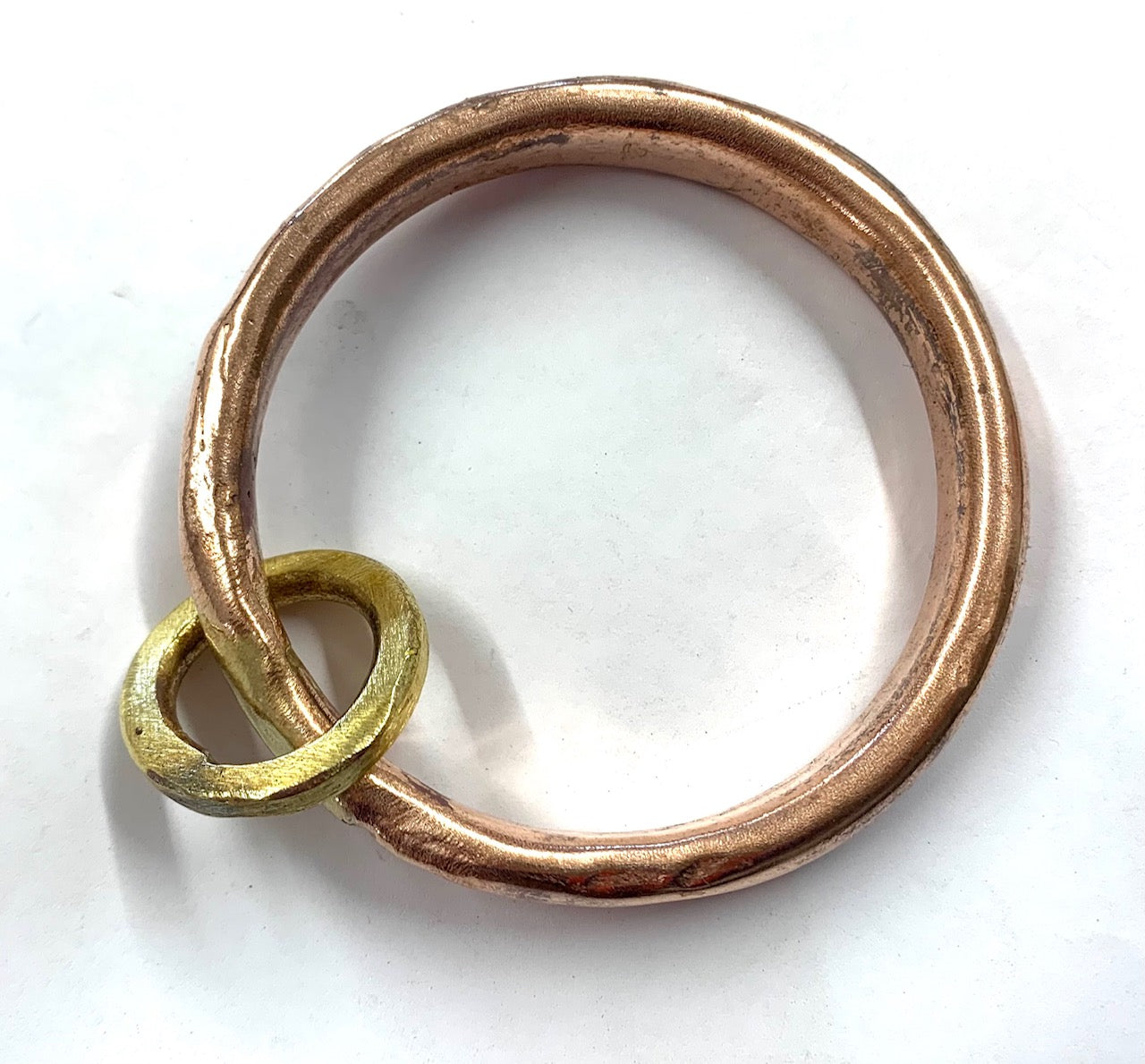 Copper anvil bangle with brass loop