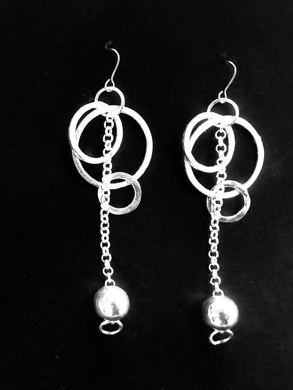 Silver hoop and chain feature earrings
