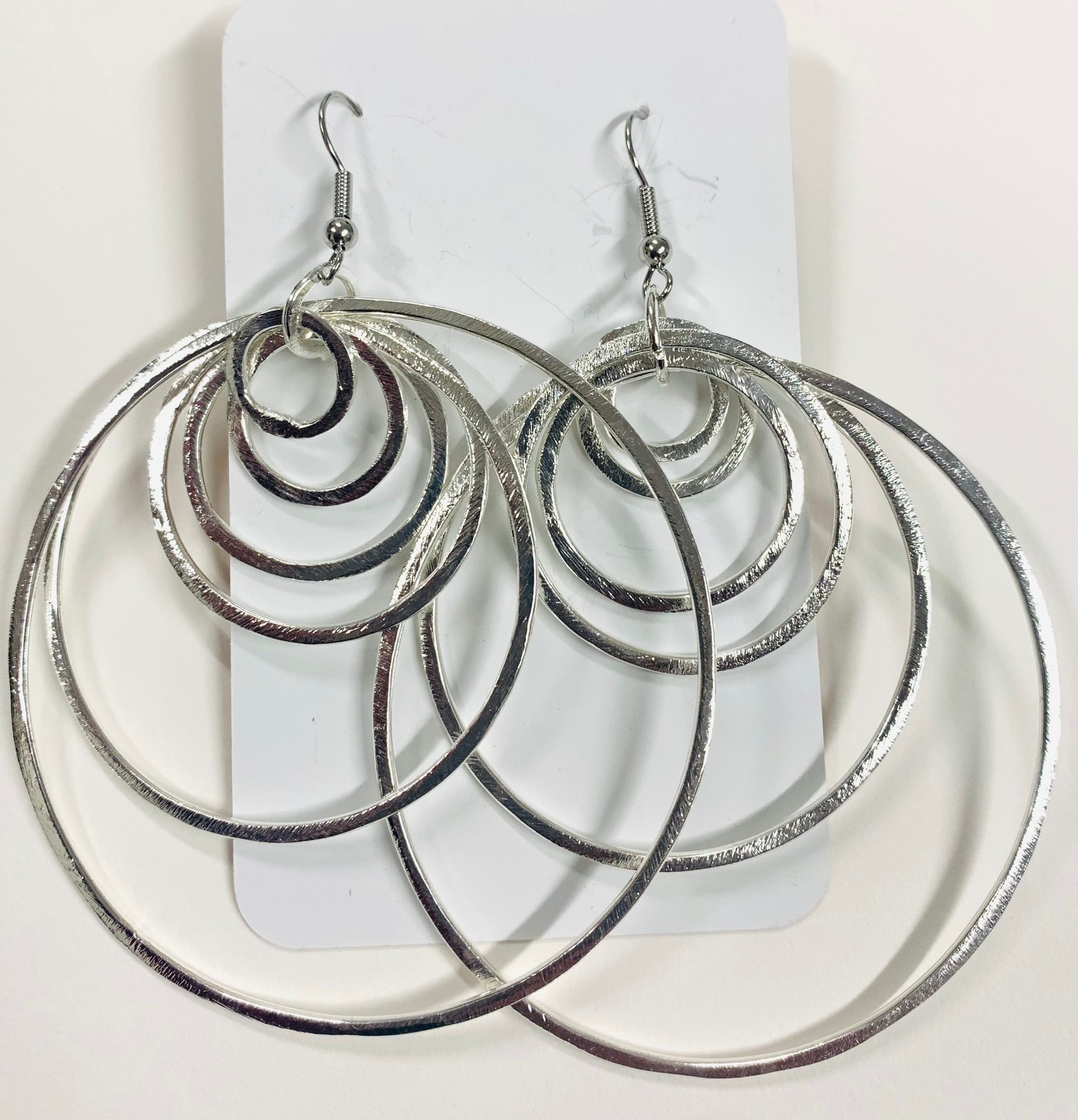 6 hoop silver feature earrings