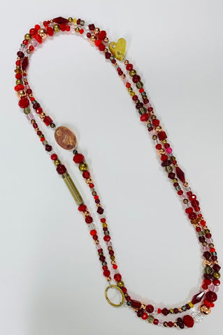 Long red glass & metal beads