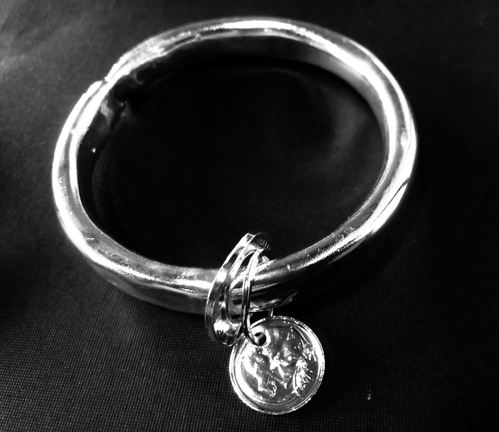 Silver anvil coin bangle