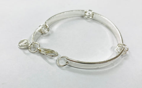 Silver arc bracelet